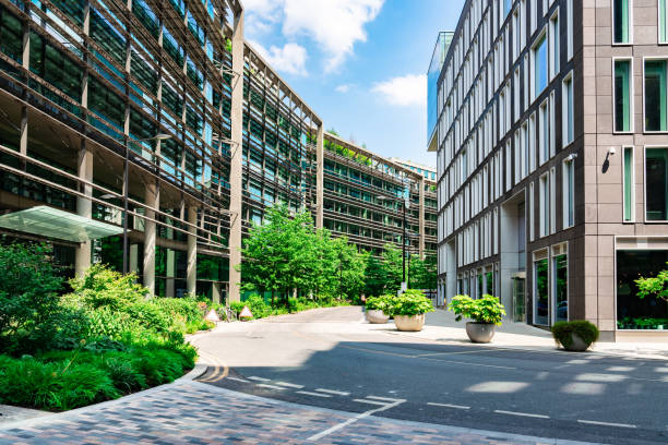 istock Modern office buildings and lush greenery in london's business district 2200266016
