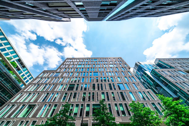 istock Modern office buildings reaching for the sky in london's financial district 2200266029