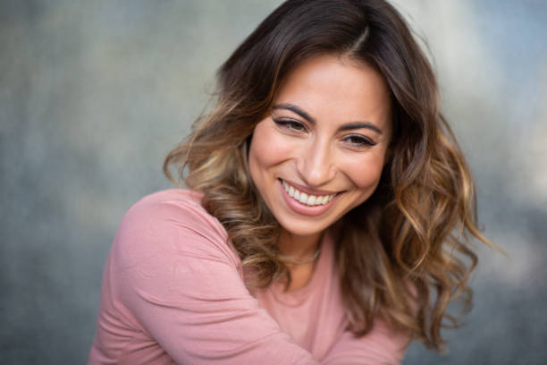 istock Close up happy smiling young woman 2200268885