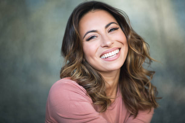 Close up portrait happy laughing young woman