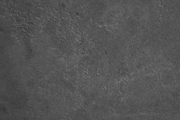 istock Gray textured surface with a rough finish in a minimalist setting 2200270178
