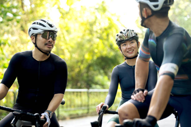 istock Friends cycling together in Singapore 2200277575