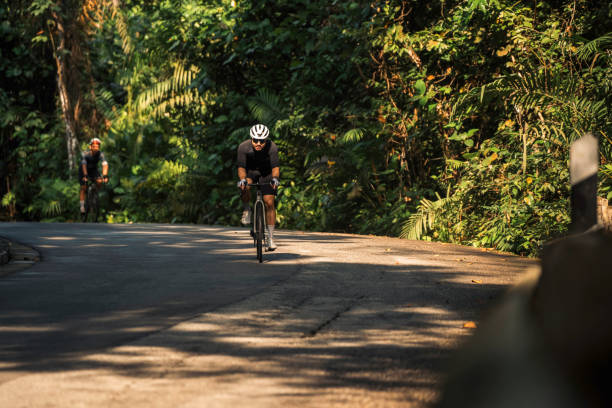 istock Male cyclist in Singapore nature area 2200277577