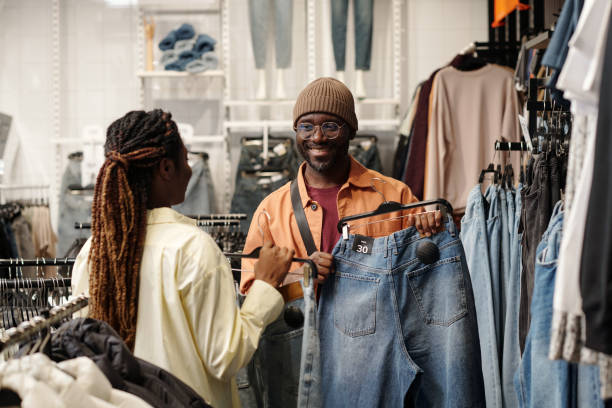 istock Helping boyfriend choose new jeans 2200284663
