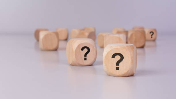 istock Wooden Question Mark Blocks - Uncertainty and Decision-Making 2200285359