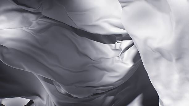 istock A suspended white fabric twists and folds, creating an elegant abstract formation. 2200298059