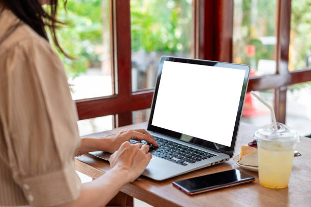 istock Young Asian woman with drinks working with laptop in cafe, Digital nomad lifestyle 2200298061