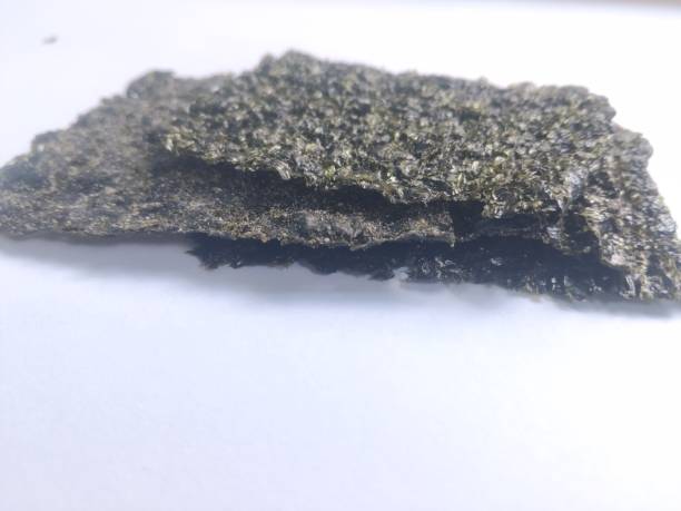 istock Korean roasted crispy nori seaweed snack isolated on white 2200300670