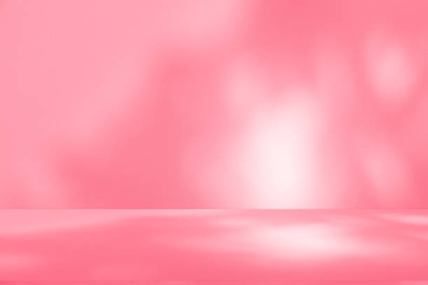 istock Wall interior background, studio, and backdrops show products. with shadow from window color white and pink light. background for text insertion and presentation of product 2200304848