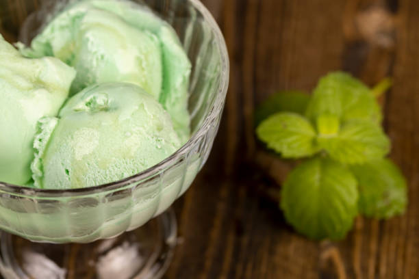 cold ice cream with mint flavor and smell, natural ice cream with mint flavor and sweet maple syrup, top view