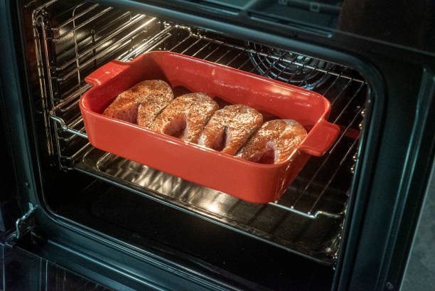 istock open door of electric oven 2200308395