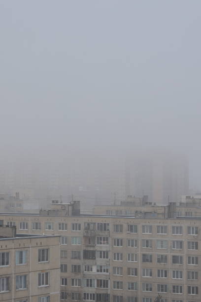 istock Urban foggy landscape with old multi-storey panel houses 2200310099