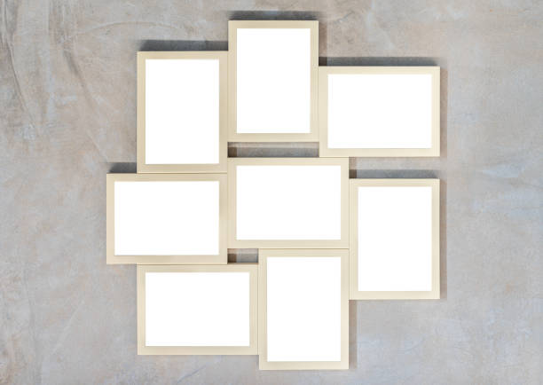 istock Eight mockup white screen in brown picture frame on cement wall. clipping path for mockup 2200311526