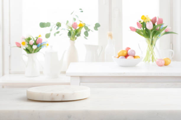 istock Marble round podium and table on blurred Easter kitchen decoration background 2200318165