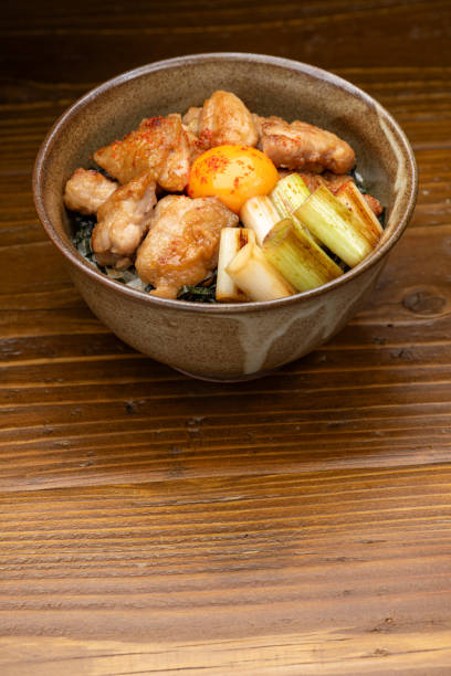 Grilled Chicken Rice Bowl with Egg Yolk and Copy Space