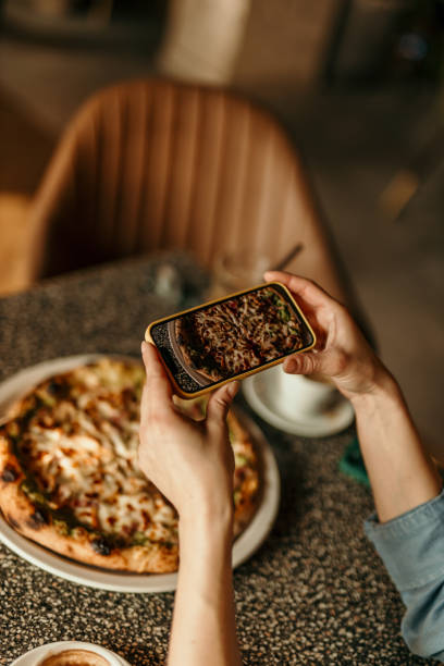 Taking photo of a pizza