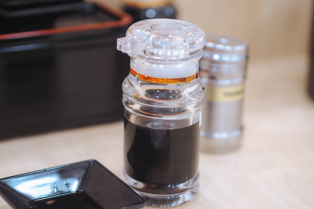 close up of shoyu in a glass bottle