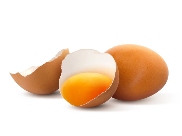 istock Cracked chicken egg with yolk isolated on white background 2200321639