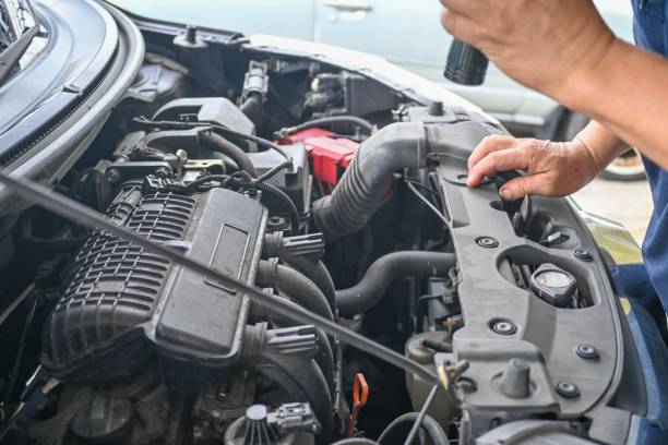 istock Car mechanic working in auto repair service 2200323191