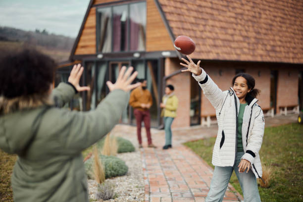 istock Playing with rugby ball in the backyard! 2200326250