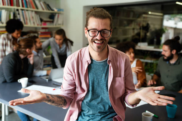 istock Leadership, tablet and hipster startup programmer CEO or manager in the office. Technology planning. 2200327302