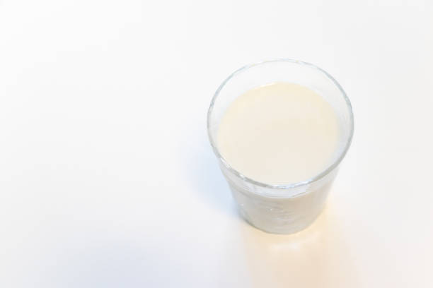 Milk being poured into a glass