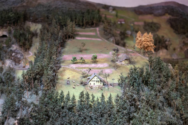istock Model railway with tunnel. A miniature scale model railway with a tunnel. 2200327559