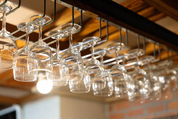 istock A row of wine glasses hanging from a rack 2200330029