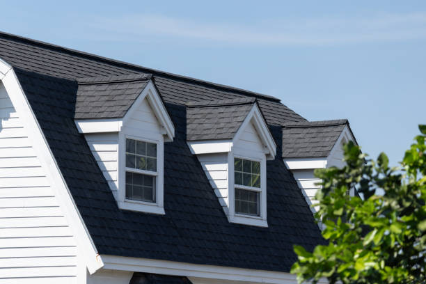 istock A house with a black roof and white trim 2200330076