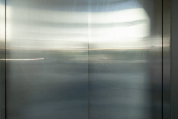 istock The silver door of an elevator is closed 2200330085