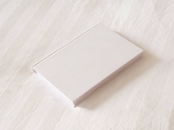istock White magazine mockup on white hotel bed 2200334016