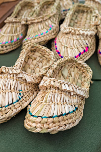 istock Crafts And Workmanship Concepts. Handmade Braided Sandals on Display At the Exhibition of Crafted Shoes 2200334769