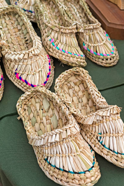 Workmanship Concepts. Handmade Braided Sandals on Display At the Exhibition of Crafted Shoes. Vertical Image