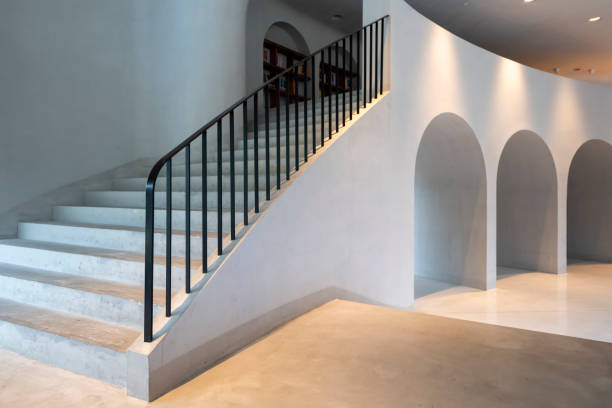 An indoor spiral staircase with a view from below