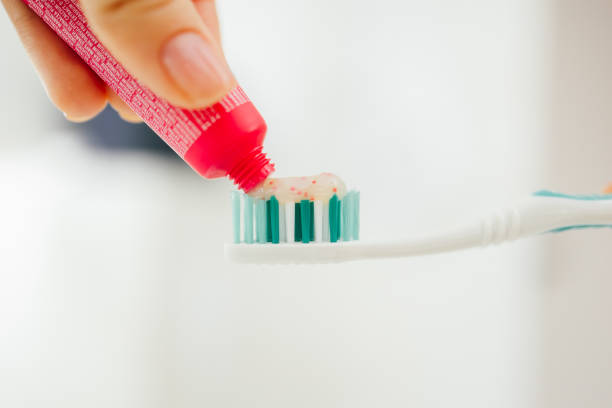 Adult man brushing teeth