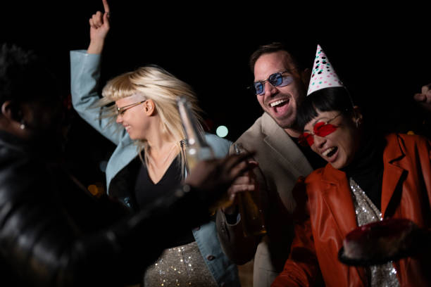 istock Friends celebrating on a night club. 2200345636
