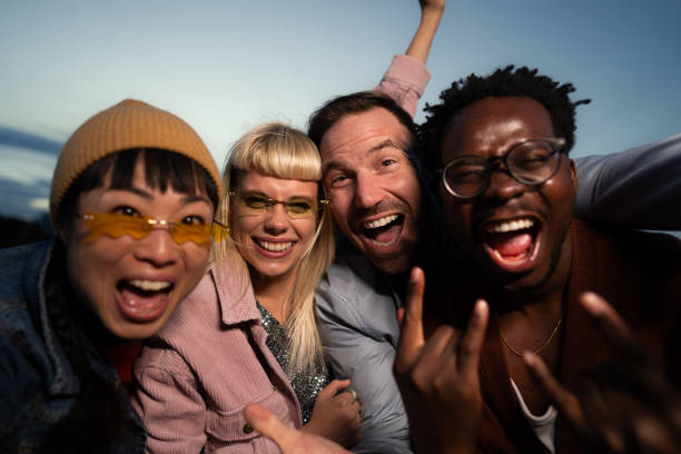 istock Friends celebrating on a night out. 2200345976