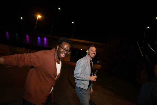 istock Friends celebrating on a night out. 2200346388