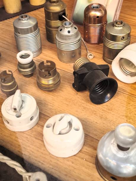 istock old electrical switches and light bulb sockets 2200346758