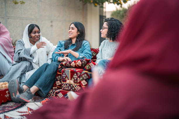 istock Diverse Women Engaging in Lively Arabian Majlis Gathering 2200346867