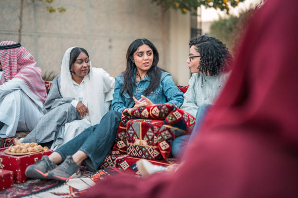 istock Diverse Women Engaging in Friendly Conversation in Majlis 2200346881