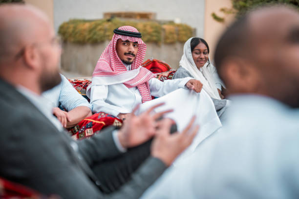 istock Diverse Group Enjoying Arabian Majlis Gathering 2200346885
