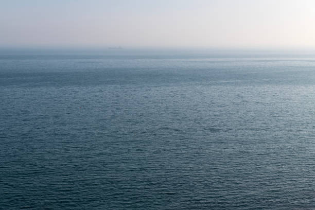 istock calm sea with the horizon 2200347693