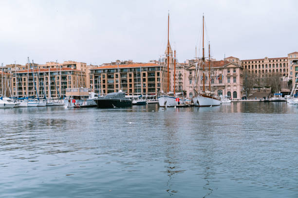 Marseille, France- 12.02.2024. The historic Vieux-Port of Marseille, lined with boats and surrounded by charming buildings