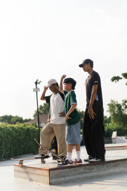 istock Young Male Friends At Skatepark 2200356080