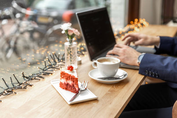 Pakistani businessman having coffee at a local cafe in the Netherlands