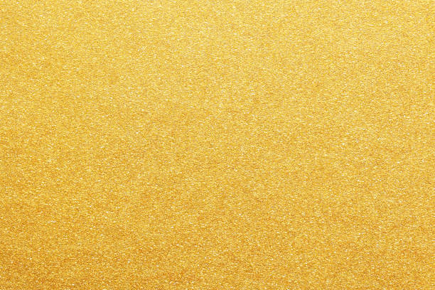 istock gold color glitter paper abstract. natural texture background. retro styled concept. 2200359520