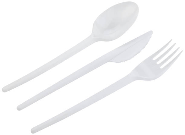 istock Disposable plastic cutlery: spoon, knife, fork isolated on a white background. Completely in focus. Focus stacking. 2200360145