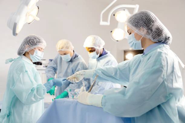 istock Group of doctors performing surgery in hospital 2200360280