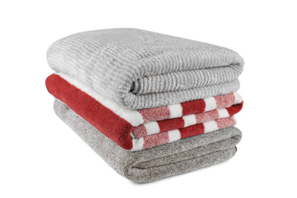 istock Soft fluffy striped grey and red bath towels folded in stack isolated on white background 2200361015